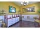 Elegant living room with hardwood floors, decorative dresser, and ample space at 1704 Via Palermo St, Plant City, FL 33566