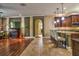 Open floor plan with modern kitchen and a comfortable living room at 1704 Via Palermo St, Plant City, FL 33566