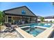 Beautiful backyard showcasing a private pool, spa, pergola, and landscaped grounds at 1704 Via Palermo St, Plant City, FL 33566