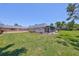 A well-manicured backyard offering great space for outdoor entertaining and leisure at 1802 Bedford Ter # 187, Sun City Center, FL 33573