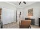 Office featuring an open door, a leather chair, and a palm tree painting at 18796 Obregan Dr, Spring Hill, FL 34610