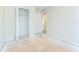Bedroom featuring an open closet, natural light, and easy access to other rooms at 1881 N Hercules Ave # 1303, Clearwater, FL 33765