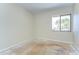 Bedroom featuring a window, and neutral-toned walls at 1881 N Hercules Ave # 1303, Clearwater, FL 33765