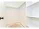 Spacious walk-in closet with ample shelving and hanging space, ready for customization at 1881 N Hercules Ave # 1303, Clearwater, FL 33765