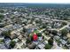 Wide aerial view highlighting the property's location within a residential community and nearby amenities at 2366 Covington Dr, Clearwater, FL 33763