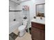 Cozy bathroom featuring a tub and shower combination with modern fixtures and a vanity sink at 2366 Covington Dr, Clearwater, FL 33763