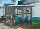 Backyard chicken coop with space for seating and plenty of room for chickens at 2366 Covington Dr, Clearwater, FL 33763
