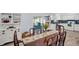 Cozy dining area with access to the kitchen and lanai at 2366 Covington Dr, Clearwater, FL 33763