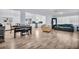 Spacious living room features wood flooring, an open floor plan, and lots of natural light at 2366 Covington Dr, Clearwater, FL 33763