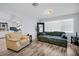 Bright living room featuring modern flooring and a large window at 2366 Covington Dr, Clearwater, FL 33763