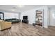 Inviting living room featuring natural light and wood floors at 2366 Covington Dr, Clearwater, FL 33763