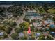 Aerial view of a residential area close to a country club with tennis courts, pools and other recreational activities at 2700 Westchester N Dr, Clearwater, FL 33761