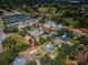 Aerial view of a residential property near a golf course and community amenities at 2700 Westchester N Dr, Clearwater, FL 33761