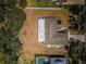 Birds eye view of the house and spacious backyard with potential for outdoor activities and entertainment at 2700 Westchester N Dr, Clearwater, FL 33761