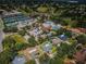 Aerial view showcasing the community amenities, including a pool and golf course, promising a vibrant and active lifestyle at 2700 Westchester N Dr, Clearwater, FL 33761