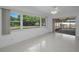 Bright bedroom with large windows providing lots of natural light and backyard views at 2700 Westchester N Dr, Clearwater, FL 33761