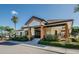 Exterior of a clubhouse with manicured landscaping, offering a welcoming entrance to its members at 2700 Westchester N Dr, Clearwater, FL 33761