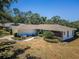 Charming single-story home featuring a brick accent, manicured landscaping, and a cozy, inviting curb appeal at 2700 Westchester N Dr, Clearwater, FL 33761