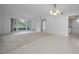 Bright living space with carpet, tile flooring and lots of natural light at 2700 Westchester N Dr, Clearwater, FL 33761