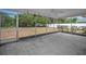 View of the screened porch with a ceiling fan and access to the backyard, perfect for relaxing and enjoying the outdoors at 2700 Westchester N Dr, Clearwater, FL 33761