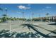 Active tennis courts with multiple players, showing an active community with various recreational activities at 2700 Westchester N Dr, Clearwater, FL 33761