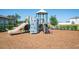 Community playground with a slide, rock climbing wall, and other activities for  at 35853 Buttonweed Trl, Zephyrhills, FL 33541