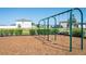 Swings at the playground and seating area for parents or guardians to enjoy time outdoors at 35853 Buttonweed Trl, Zephyrhills, FL 33541