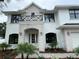 A beautiful exterior featuring brick, black framed windows and a balcony at 3910 W San Carlos St, Tampa, FL 33629