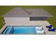 Swimming pool and lounge chairs in backyard at 3910 W San Carlos St, Tampa, FL 33629