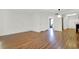 Open living space with hardwood floors and ample natural light with neutral wall colors at 404 Danube Ave, Tampa, FL 33606