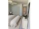 Cozy bedroom with neutral tones, a ceiling fan, and ample closet space at 414 Danube Ave, Tampa, FL 33606