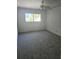 Cozy bedroom with carpet and ample natural light at 414 Danube Ave, Tampa, FL 33606