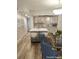 Bright kitchen featuring a center island with bar seating and modern appliances at 414 Danube Ave, Tampa, FL 33606
