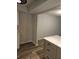 Charming kitchen space showcasing island with countertop, storage, and updated flooring at 414 Danube Ave, Tampa, FL 33606