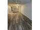 Spacious living room with hardwood floors and open floor plan at 414 Danube Ave, Tampa, FL 33606