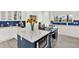 Beautiful kitchen showcasing white cabinets, quartz countertops, and updated appliances at 420 48Th N St, St Petersburg, FL 33713