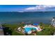Aerial view of the community pool and waterfront at 5155 Isla Key S Blvd # 304, St Petersburg, FL 33715
