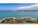 Beautiful waterfront condos featuring an aerial view of the community and ocean view at 5155 Isla Key S Blvd # 304, St Petersburg, FL 33715