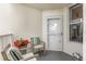 Relaxing balcony with chairs, pillows, and flowers creating an inviting outdoor space at 5155 Isla Key S Blvd # 304, St Petersburg, FL 33715