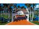 Elegant entrance to Sea Key lined with palm trees, creating an inviting and luxurious arrival experience at 5155 Isla Key S Blvd # 304, St Petersburg, FL 33715