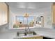 Kitchen view showcasing the open floor plan, living area and waterfront views at 5155 Isla Key S Blvd # 304, St Petersburg, FL 33715