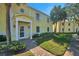 Inviting condominium complex entrance with well-maintained landscaping and a welcoming doorway, perfect for modern living at 5240 Coquina Key Se Dr # B, St Petersburg, FL 33705