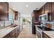 Spacious kitchen featuring sleek countertops, modern appliances, and an inviting design at 5240 Coquina Key Se Dr # B, St Petersburg, FL 33705