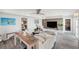 Contemporary living room with neutral tones, stylish furnishings, and ample natural light at 5240 Coquina Key Se Dr # B, St Petersburg, FL 33705