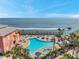 Community pool and sundeck offer beautiful waterfront views and dock access for endless summer enjoyment at 5240 Coquina Key Se Dr # B, St Petersburg, FL 33705