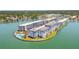 Beautiful aerial view of waterfront building, pool, and surrounding landscape at 5960 30Th S Ave # 414, Gulfport, FL 33707