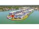 Aerial view of beautiful waterfront building, pool, and surrounding landscape at 5960 30Th S Ave # 414, Gulfport, FL 33707
