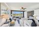Cozy living room featuring water views, ample seating, and natural light at 5960 30Th S Ave # 414, Gulfport, FL 33707