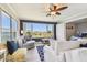 Bright living room offers water views, comfortable seating, and access to a bedroom at 5960 30Th S Ave # 414, Gulfport, FL 33707