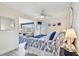 View of the main bedroom reveals the stylish decor and direct access to the living area at 5960 30Th S Ave # 414, Gulfport, FL 33707